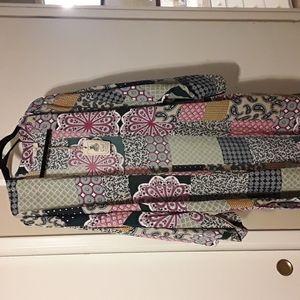 Multi colored cover up size medium.